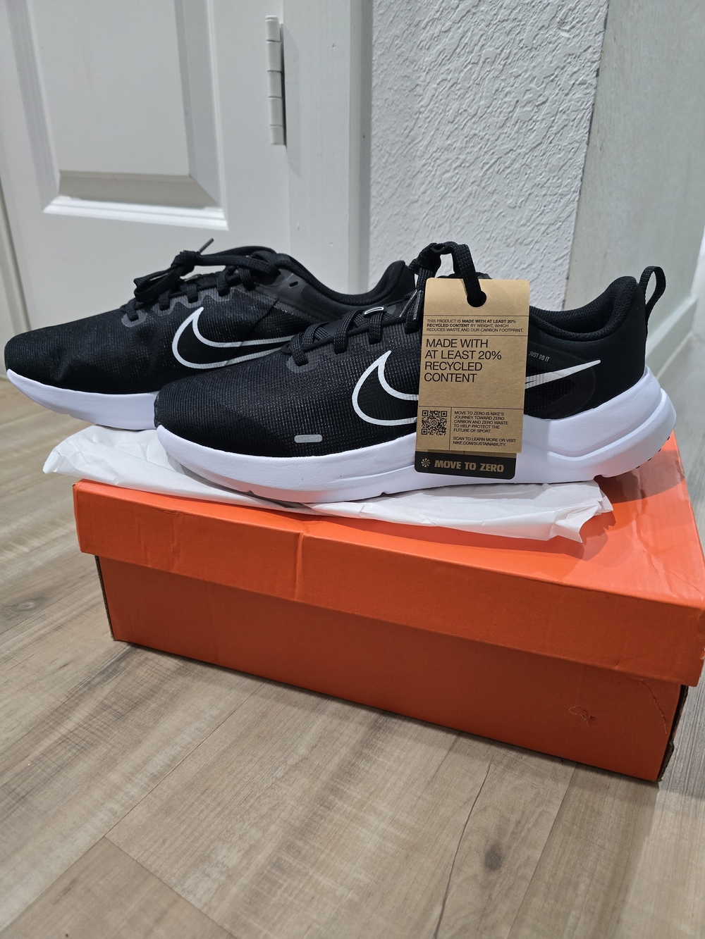 Nike Men's Black Running Shoes with White Swoosh